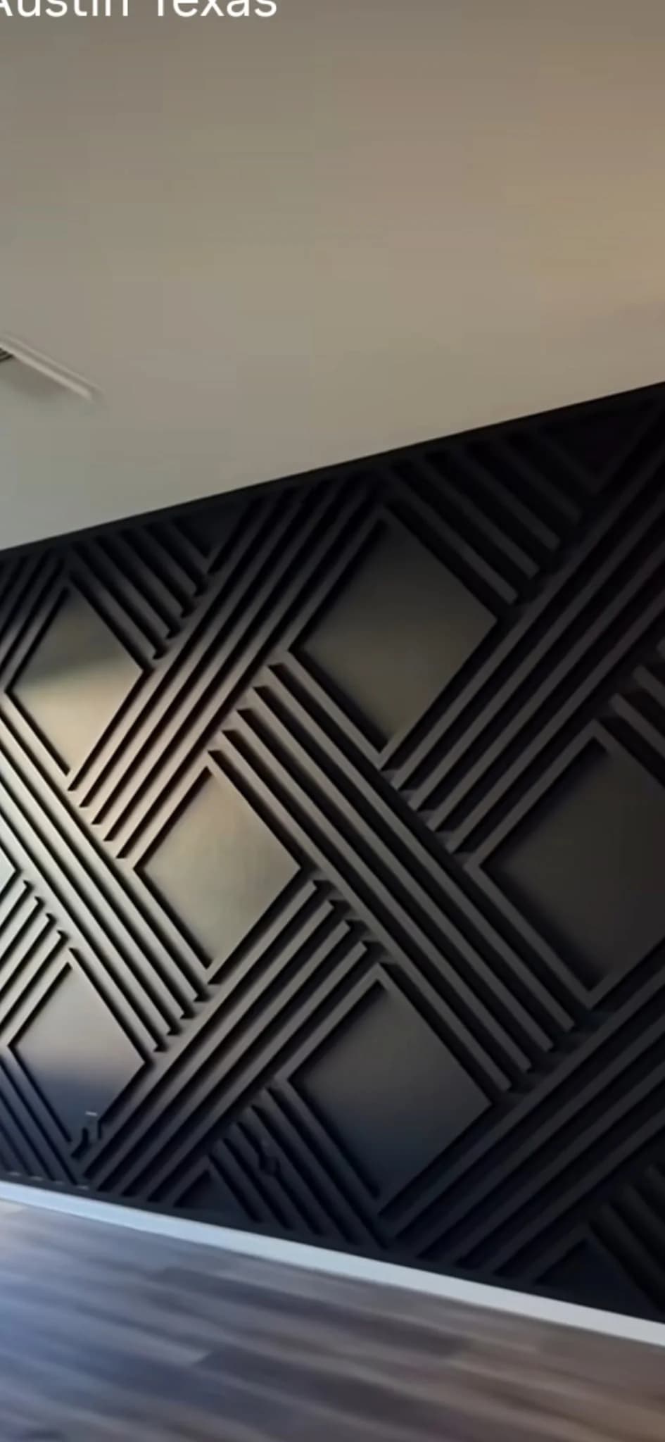 Finished interior feature wall with evenly spaced wood details